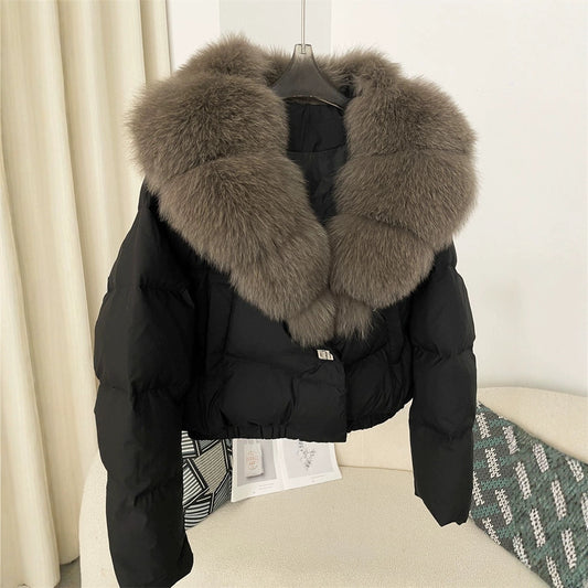 Women's short fashionable warm down jacket with a stylish and oversized real fox fur collar