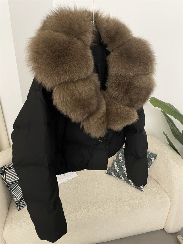 Women's short fashionable warm down jacket with a stylish and oversized real fox fur collar